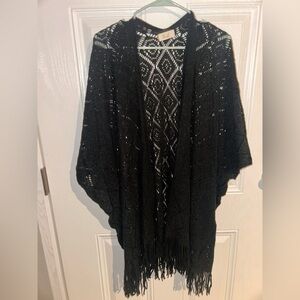 Elegant Black Knit Poncho with Fringe
